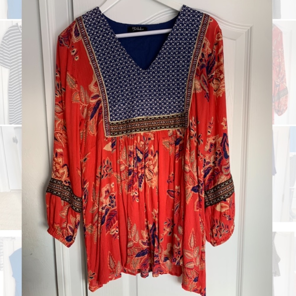 Adorable bright colored blouse size large.